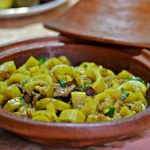 Moroccan clay tagine dish with beef and bottle gourds